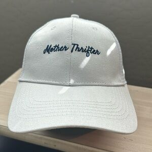 NWOT White trucker hat with navy lettering for the thrifting enthusiast